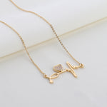 Pave CZ Heart And Heartbeat Necklace Rose Gold Yellow Gold Rhodium